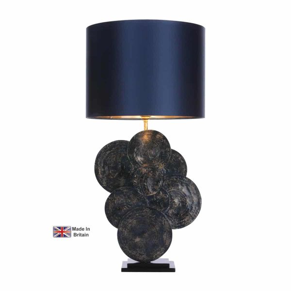 Planet single light table lamp in inky blue and gold with Poseidon shade lit