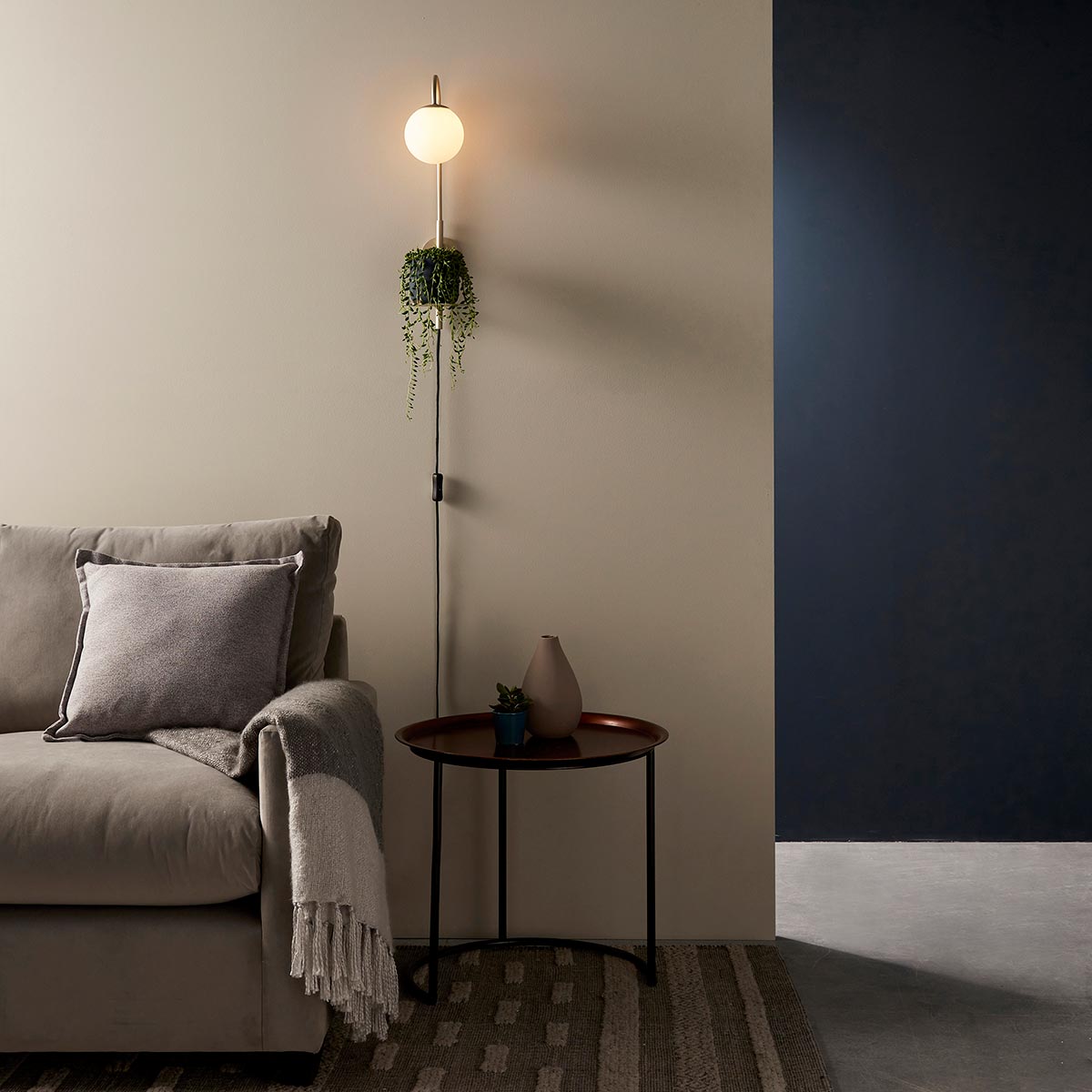 Plug in wall lights category thumbnail showing plug in wall light fitted in sitting room