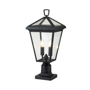 Quintiesse Alford Place 2 light outdoor pedestal lantern in museum black on white background lit