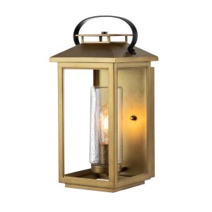 Quintiesse Atwater medium rust proof 1 light outdoor wall box lantern in distressed brass on white background lit