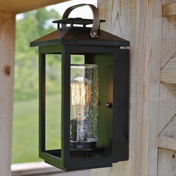 Quintiesse Atwater small rust proof 1 light outdoor wall box lantern in matt black fitted to wooden outbuilding