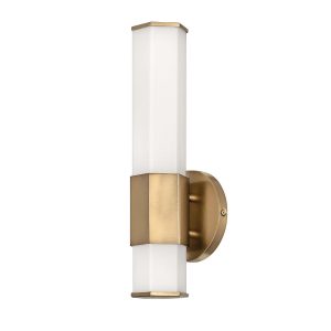 Quintiesse Facet 1 light LED bathroom wall light in heritage brass on white background