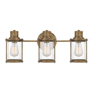 Quoizel Riggs 3 light bathroom wall light in weathered brass on white background
