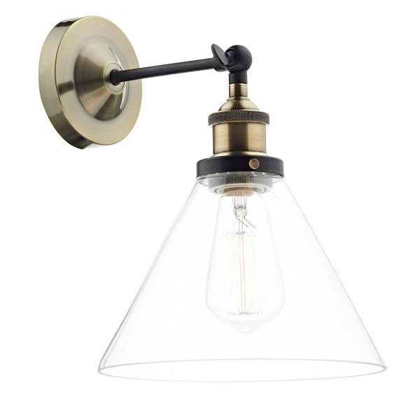 Dar Ray single wall light in antique brass on white background