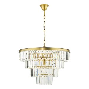 Rhapsody 6 light tiered crystal chandelier in solid natural brass on white background lit