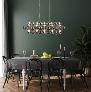 Berry 25 light linear ceiling pendant chandelier in polished chrome over dining table