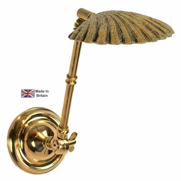 Oyster adjustable bedroom wall light in solid brass shown polished