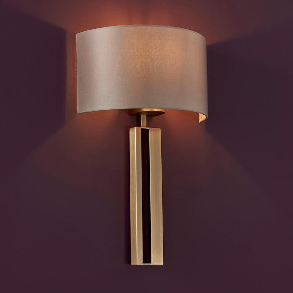 Slotted wall light in aged brass with mink half shade main image