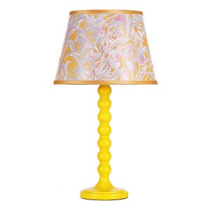 Spool wooden table lamp base only finished in gloss yellow on white background