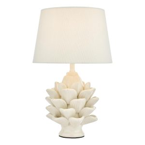 Zala ceramic artichoke small table lamp with cream glaze and white cotton shade on white background lit